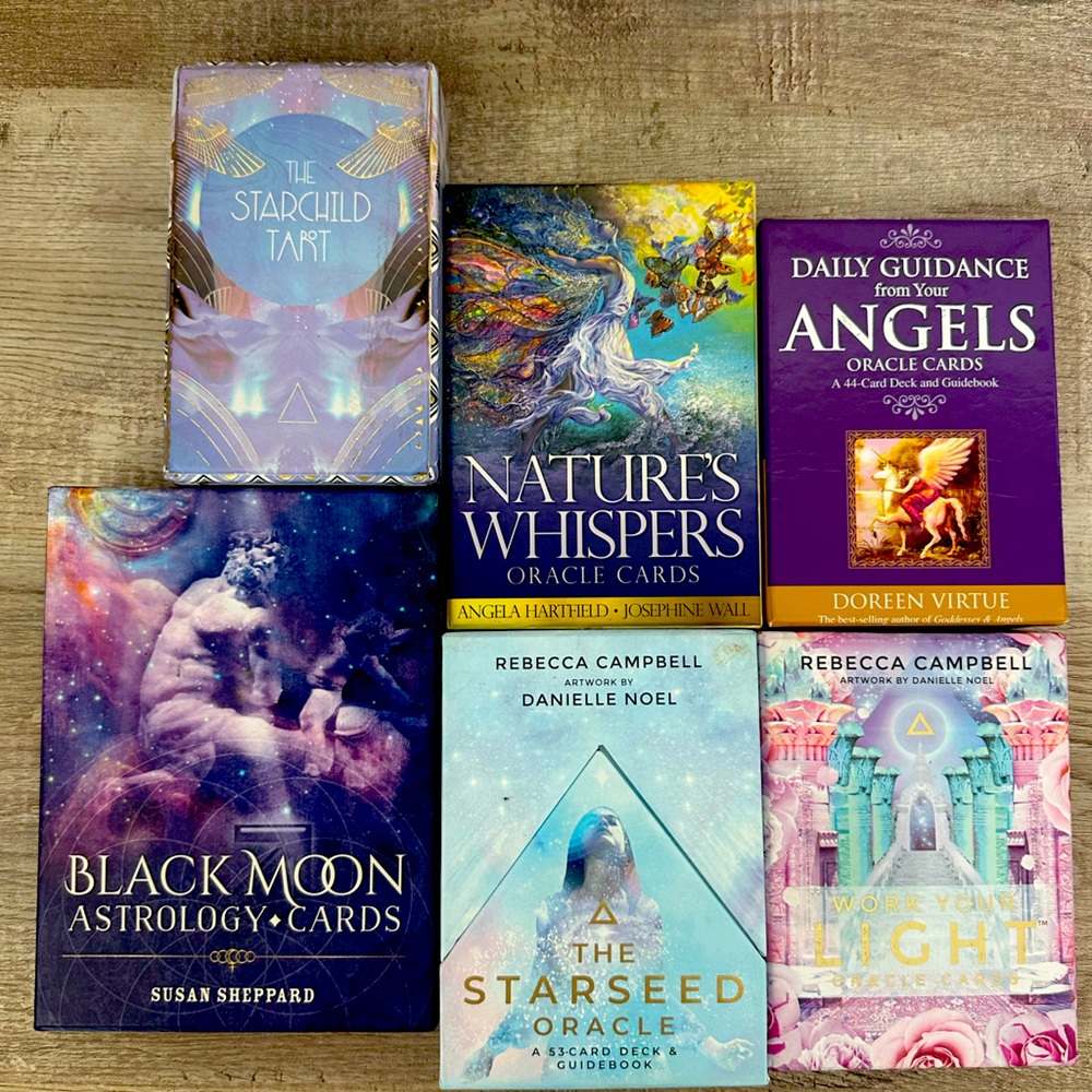 6 tarot decks all like new only sold as a bundle